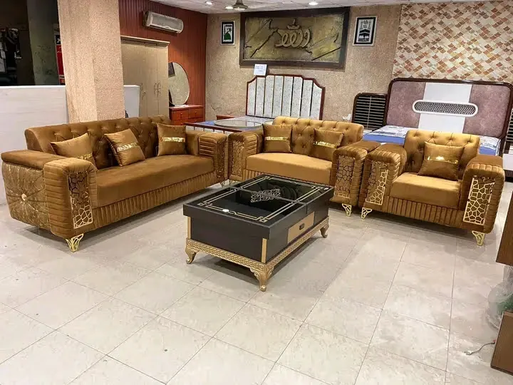 A velvet sofa set with carved gold-finished trim